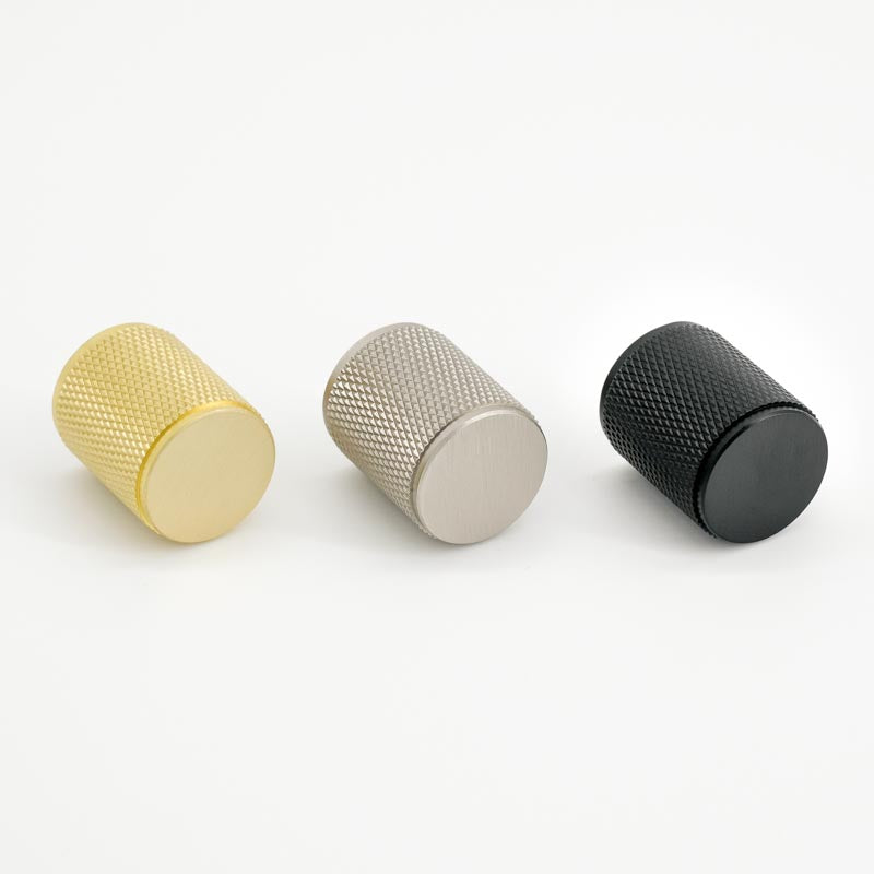 Knurled knobs in brushed brass, brushed nickel, and matte black. Potter and Clay