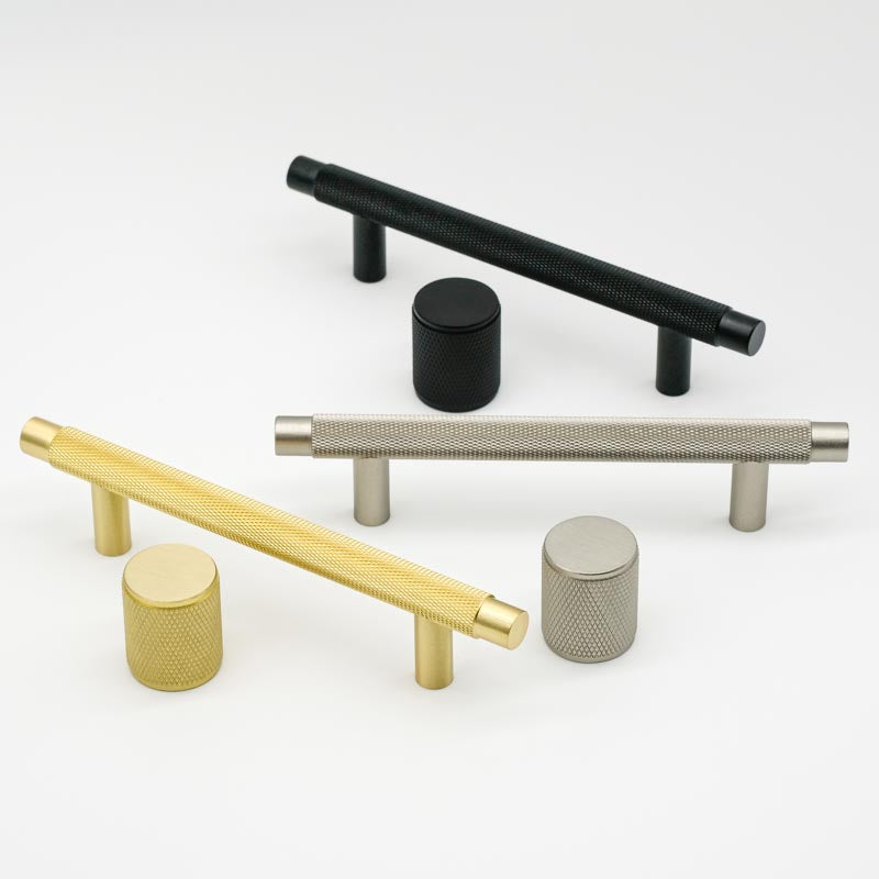 Knurled knobs and pulls in brushed brass, brushed nickel, and matte black. Potter and Clay